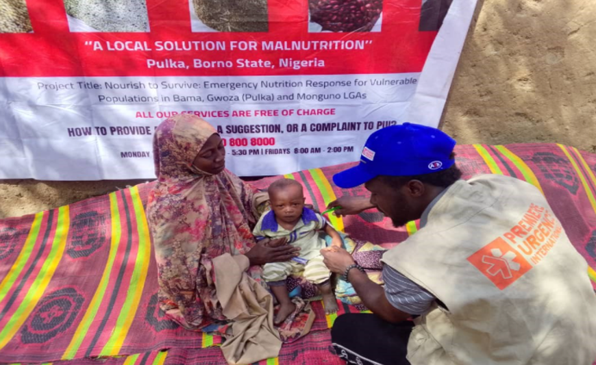 Fatima Musa and her son